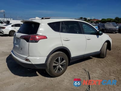 Trzecie zdjęcie samochodu z tyłu: 2016 TOYOTA RAV4 LE VIN:2T3BFREV0GW411694 - miniatura