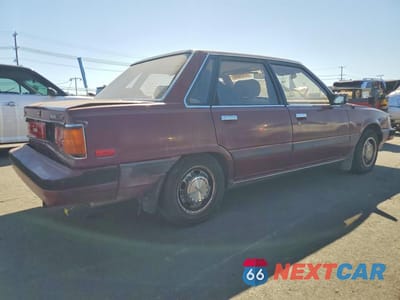 Trzecie zdjęcie samochodu z tyłu: 1986 TOYOTA CAMRY LE VIN:JT2SV16E6G0408976 - miniatura