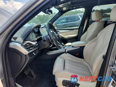 Zdjęcie 7 z 12 samochodu: 2014 BMW X5 XDRIVE35I VIN:5UXKR0C57E0H23178 - miniatura