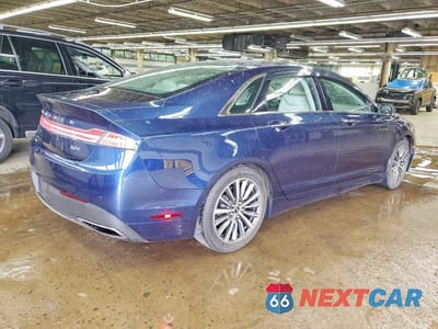 Trzecie zdjęcie samochodu z tyłu: 2017 LINCOLN MKZ PREMIERE VIN:3LN6L5A98HR647961 - miniatura