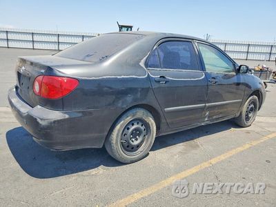 Trzecie zdjęcie samochodu z tyłu: 2003 TOYOTA COROLLA CE VIN:1NXBR32EX3Z118946 - miniatura