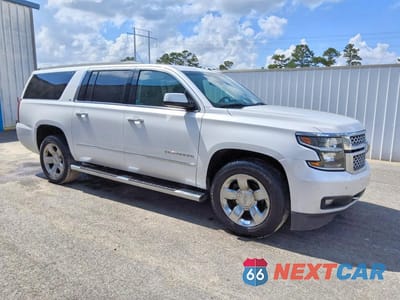 Czwarte zdjęcie samochodu z boku: 2016 CHEVROLET SUBURBAN C1500 LT VIN:1GNSCHKC1GR454227 - miniatura