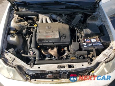 Zdjęcie 11 z 13 samochodu: 2000 TOYOTA AVALON XLS VIN:4T1BF28B8YU106091 - miniatura