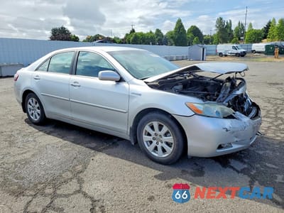 Czwarte zdjęcie samochodu z boku: 2009 TOYOTA CAMRY HYBRID VIN:4T1BB46K59U101958 - miniatura