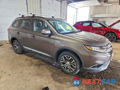 Czwarte zdjęcie samochodu z boku: 2016 MITSUBISHI OUTLANDER SE VIN:JA4AD3A30GZ015763 - miniatura