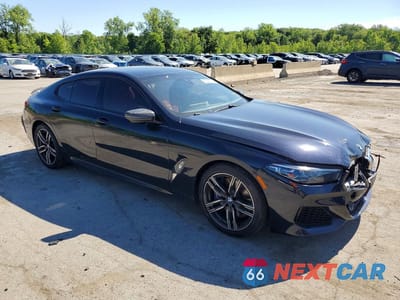 Czwarte zdjęcie samochodu z boku: 2022 BMW 840XI VIN:WBAGV4C01NCJ13106 - miniatura