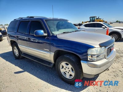 Czwarte zdjęcie samochodu z boku: 2000 GMC YUKON VIN:1GKEK13T2YJ125216 - miniatura