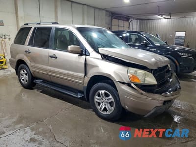 Czwarte zdjęcie samochodu z boku: 2003 HONDA PILOT EX VIN:2HKYF18413H606557 - miniatura