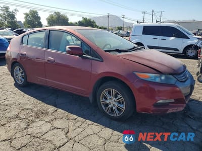 Czwarte zdjęcie samochodu z boku: 2010 HONDA INSIGHT EX VIN:JHMZE2H74AS034601 - miniatura