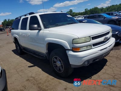 Czwarte zdjęcie samochodu z boku: 2002 CHEVROLET SUBURBAN K1500 VIN:3GNFK16ZX2G361371 - miniatura