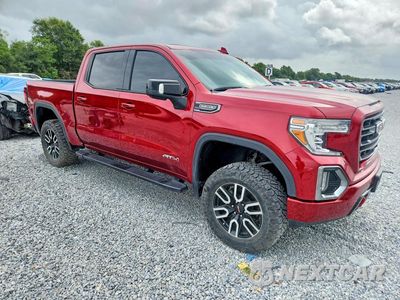 Czwarte zdjęcie samochodu z boku: 2021 GMC SIERRA K1500 AT4 VIN:3GTP9EED8MG310993 - miniatura