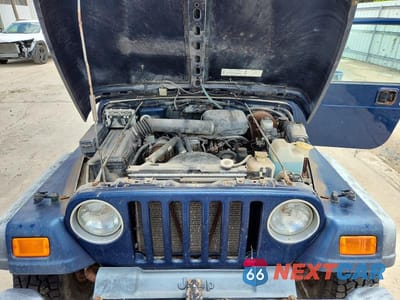 Zdjęcie 11 z 12 samochodu: 2000 JEEP WRANGLER / TJ SE VIN:1J4FA29P2YP771267 - miniatura