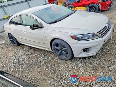 Czwarte zdjęcie samochodu z boku: 2013 VOLKSWAGEN CC SPORT VIN:WVWBN7AN1DE565220 - miniatura