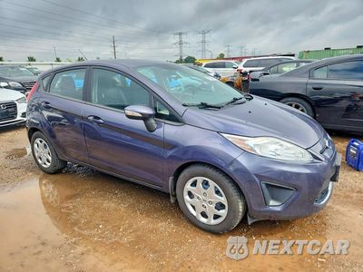 Czwarte zdjęcie samochodu z boku: 2013 FORD FIESTA SE VIN:3FADP4EJ6DM131965 - miniatura