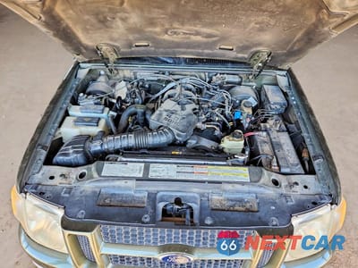 Zdjęcie 11 z 13 samochodu: 2001 FORD EXPLORER SPORT TRAC VIN:1FMZU77E81UB74569 - miniatura