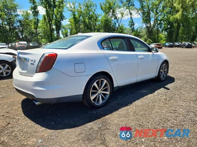 Trzecie zdjęcie samochodu z tyłu: 2011 LINCOLN MKS VIN:1LNHL9FT8BG606684 - miniatura