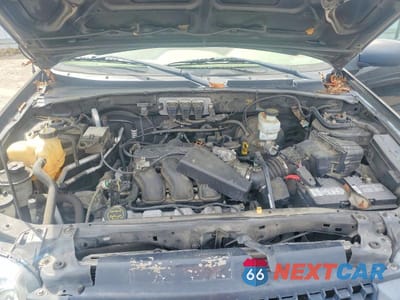 Zdjęcie 12 z 13 samochodu: 2005 FORD ESCAPE XLT VIN:1FMYU93125KC70435 - miniatura