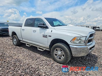 Czwarte zdjęcie samochodu z boku: 2014 RAM 2500 SLT VIN:3C6UR5DJ4EG217567 - miniatura
