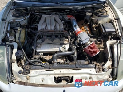 Zdjęcie 11 z 12 samochodu: 2002 MITSUBISHI ECLIPSE SPYDER GT VIN:4A3AE85H72E067748 - miniatura
