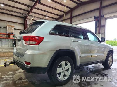 Trzecie zdjęcie samochodu z tyłu: 2013 JEEP GRAND CHEROKEE LAREDO VIN:1C4RJFAG1DC604261 - miniatura