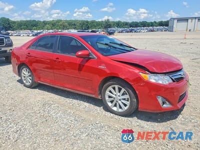 Czwarte zdjęcie samochodu z boku: 2012 TOYOTA CAMRY HYBRID XLE VIN:4T1BD1FK2CU054517 - miniatura