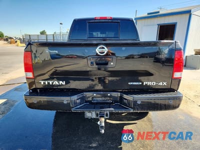 Zdjęcie 6 z 12 samochodu: 2014 NISSAN TITAN PRO-4X VIN:1N6BA0EC7EN511205 - miniatura
