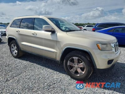 Czwarte zdjęcie samochodu z boku: 2011 JEEP GRAND CHEROKEE LAREDO VIN:1J4RS4GG4BC739444 - miniatura