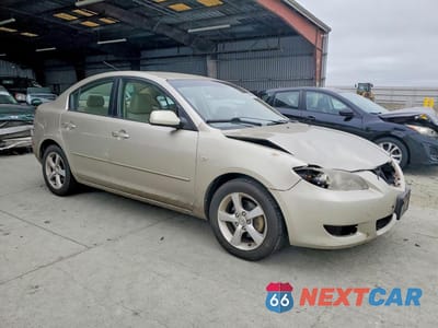 Czwarte zdjęcie samochodu z boku: 2005 MAZDA 3 I VIN:JM1BK12F451268884 - miniatura