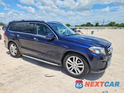 Czwarte zdjęcie samochodu z boku: 2017 MERCEDES-BENZ GLS 450 4MATIC VIN:4JGDF6EEXHA829635 - miniatura