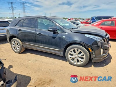 Czwarte zdjęcie samochodu z boku: 2021 CADILLAC XT5 SPORT VIN:1GYKNGRS6MZ105094 - miniatura