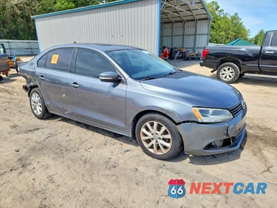 Czwarte zdjęcie samochodu z boku: 2012 VOLKSWAGEN JETTA SE VIN:3VWDX7AJ3CM326161 - miniatura