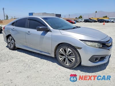 Czwarte zdjęcie samochodu z boku: 2016 HONDA CIVIC EXL VIN:2HGFC1F79GH642252 - miniatura