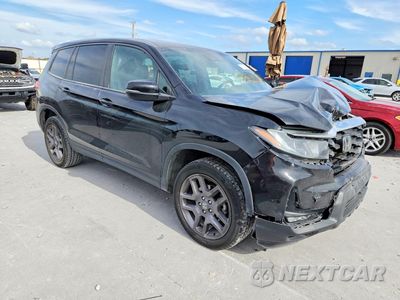 Czwarte zdjęcie samochodu z boku: 2023 HONDA PASSPORT EXL VIN:5FNYF8H51PB009513 - miniatura