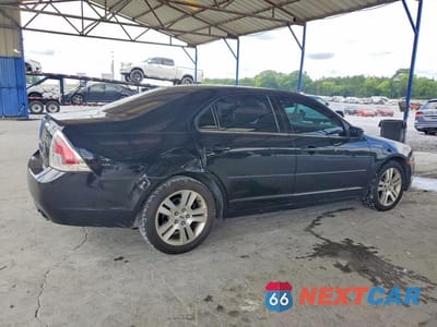 Trzecie zdjęcie samochodu z tyłu: 2006 FORD FUSION SEL VIN:3FAFP08196R107453 - miniatura