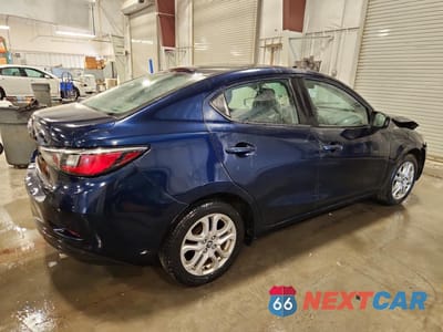 Trzecie zdjęcie samochodu z tyłu: 2017 TOYOTA YARIS IA BASE VIN:3MYDLBYV8HY196048 - miniatura