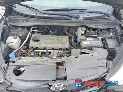 Zdjęcie 12 z 13 samochodu: 2013 HYUNDAI TUCSON GLS VIN:KM8JUCAC6DU755179 - miniatura