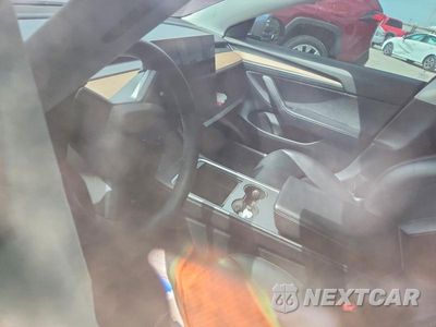 Zdjęcie 8 z 13 samochodu: 2022 TESLA MODEL 3 VIN:5YJ3E1EB5NF138334 - miniatura