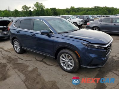Czwarte zdjęcie samochodu z boku: 2024 HONDA CR-V EXL VIN:2HKRS4H73RH411211 - miniatura