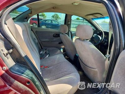 Zdjęcie 10 z 13 samochodu: 2002 SATURN SL1 VIN:XG8ZH52842Z312766 - miniatura