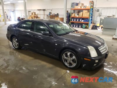 Czwarte zdjęcie samochodu z boku: 2005 CADILLAC STS VIN:1G6DC67A150214242 - miniatura
