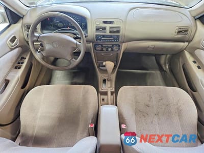 Zdjęcie 8 z 12 samochodu: 2001 TOYOTA COROLLA LE VIN:1NXBR12E61Z558048 - miniatura