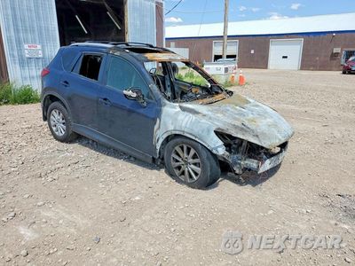 Czwarte zdjęcie samochodu z boku: 2016 MAZDA CX-5 TOURING VIN:JM3KE4CYXG0866289 - miniatura