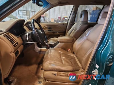 Zdjęcie 7 z 13 samochodu: 2003 HONDA PILOT EXL VIN:2HKYF18643H503974 - miniatura