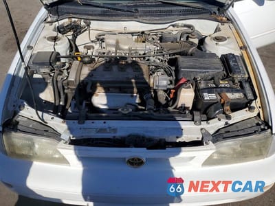 Zdjęcie 11 z 12 samochodu: 1997 TOYOTA COROLLA DX VIN:1NXBB02E9VZ515263 - miniatura