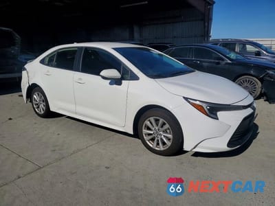 Czwarte zdjęcie samochodu z boku: 2024 TOYOTA COROLLA HYBRID LE VIN:JTDBCMFE6R3047104 - miniatura