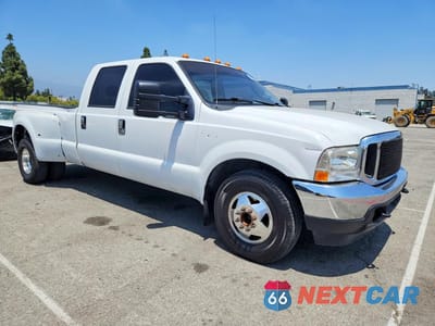 Czwarte zdjęcie samochodu z boku: 2004 FORD F350 SUPER DUTY VIN:1FTWW32P74EB79098 - miniatura