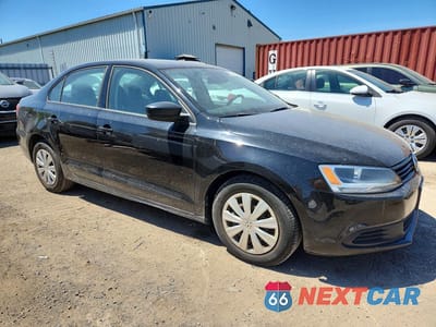Czwarte zdjęcie samochodu z boku: 2012 VOLKSWAGEN JETTA BASE VIN:3VW2K7AJ6CM377997 - miniatura