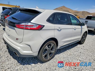 Trzecie zdjęcie samochodu z tyłu: 2019 FORD EDGE ST VIN:2FMPK4AP9KBC21900 - miniatura