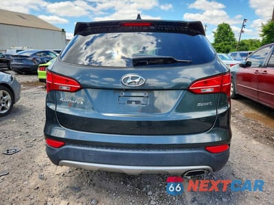 Zdjęcie 6 z 13 samochodu: 2014 HYUNDAI SANTA FE SPORT 2.4L VIN:5XYZU3LB2EG154785 - miniatura