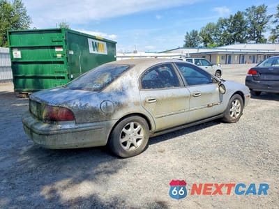 Trzecie zdjęcie samochodu z tyłu: 2002 MERCURY SABLE GS VIN:1MEFM50U02G640314 - miniatura